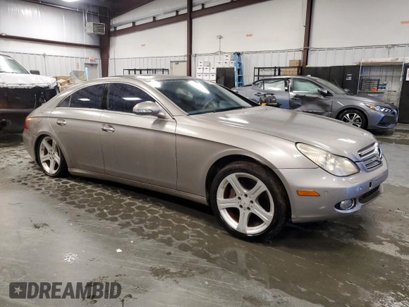 2007 Mercedes-Benz CLS-Class 5.5L with VIN WDDDJ72X77A084281, listed as a Copart auction lot 51673165 with 248,113 mi miles and Salvage Title. Bid and sale history available at carsss.com. Image 4.
