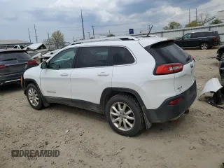 2015 Jeep Cherokee Limited z VIN 1C4PJMDS3FW511528, wystawiony jako Copart lot #54395845 z przebiegiem 167 643 mil mil oraz Czysty tytuł • Clean title. Historia ofert i sprzedaży dostępna na DreamBid. Obrazek 2.
