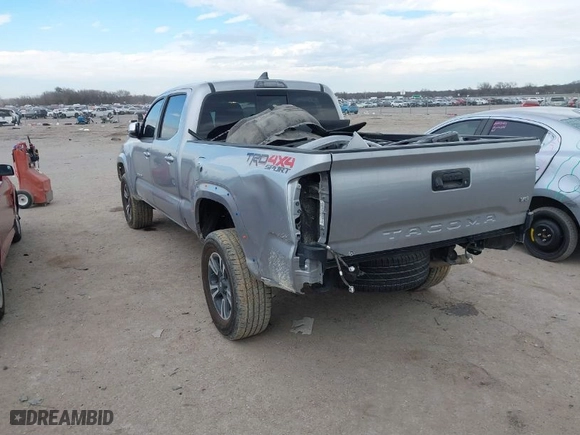 2019 Toyota Tacoma 4WD SR5 with VIN 3TMDZ5BN9KM061604, listed as a IAAI auction lot 41274995 with 87,834 mi miles. Bid and sale history available at carsss.com. Image 3.
