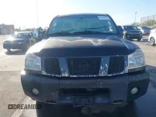 2004 Nissan Titan SE with VIN 1N6AA06A14N574940, listed as a IAAI auction lot 41821005 with 202,373 mi miles. Bid and sale history available at carsss.com. Image 12.