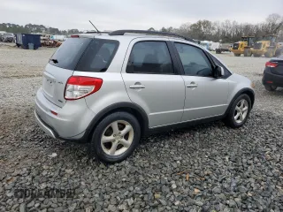 2009 Suzuki SX4 with VIN JS2YB413195101423, listed as a Copart auction lot 85321624 with 127,917 mi miles and Salvage Title. Bid and sale history available at carsss.com. Image 3.