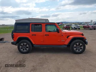 2018 Jeep Wrangler Unlimited Sahara с VIN 1C4HJXEG4JW304820, выставлен на аукционе IAAI как лот 42206997 с пробегом 113 047 миль миль и . История ставок и продаж доступна на DreamBid. Изображение 14.