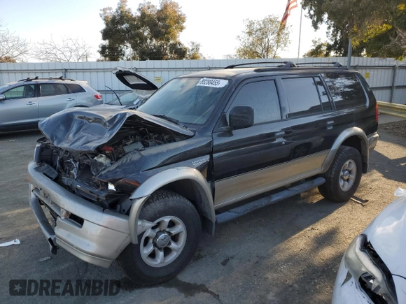 1999 Mitsubishi Montero LS z VIN JA4LS31H5XP006983, wystawiony jako Copart lot #88288455 z przebiegiem 161 647 mil mil oraz Czysty tytuł • Clean title. Historia ofert i sprzedaży dostępna na DreamBid. Obrazek 1.