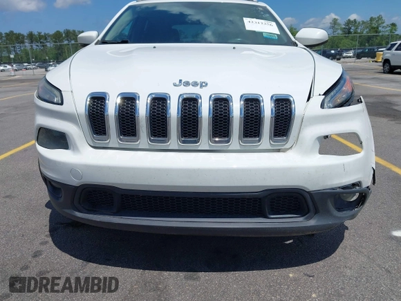 2016 Jeep Cherokee Latitude with VIN 1C4PJLCB0GW291357, listed as a IAAI auction lot 42312356 with 105,692 mi miles and . Bid and sale history available at DreamBid. Image 6.