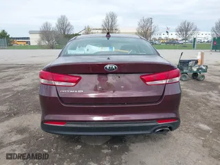2016 Kia Optima LX with VIN 5XXGT4L36GG108599, listed as a IAAI auction lot 42065639 with 127,387 mi miles. Bid and sale history available at carsss.com. Image 16.