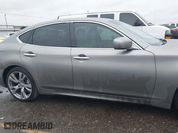 2013 Infiniti M37 with VIN JN1BY1AP7DM511497, listed as a IAAI auction lot 41294499 with 174,977 mi miles. Bid and sale history available at carsss.com. Image 13.