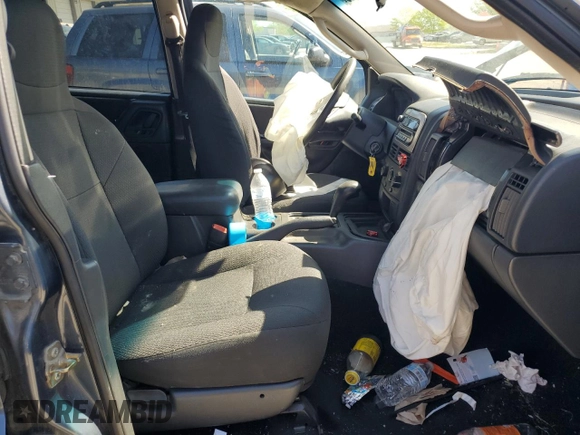 2004 Jeep Grand Cherokee Laredo with VIN 1J4GX48S74C195326, listed as a Copart auction lot 53993785 with 280,456 mi miles and Salvage title. Bid and sale history available at DreamBid. Image 7.
