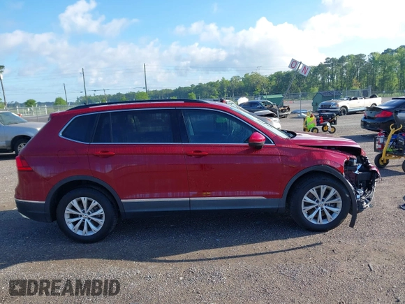 2018 Volkswagen Tiguan SEL z VIN 3VV3B7AX3JM054842, wystawiony jako IAAI lot #42240503 z przebiegiem 47 300 mil mil oraz . Historia ofert i sprzedaży dostępna na DreamBid. Obrazek 13.