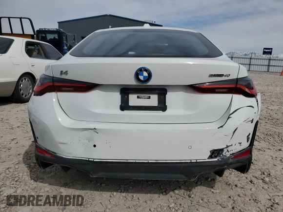 2023 BMW i4 eDrive40 with VIN WBY73AW06PFN62929, listed as a Copart auction lot 49281324 with 13,015 mi miles. Bid and sale history available at carsss.com. Image 6.