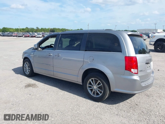 2014 Dodge Grand Caravan SXT with VIN 2C4RDGCG3ER193688, listed as a IAAI auction lot 41290544 with 73,092 mi miles and . Bid and sale history available at DreamBid. Image 3.