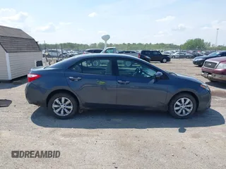 2015 Toyota Corolla L z VIN 5YFBURHE5FP252830, wystawiony jako IAAI lot #42234851 z przebiegiem 132 237 mil mil oraz . Historia ofert i sprzedaży dostępna na DreamBid. Obrazek 14.