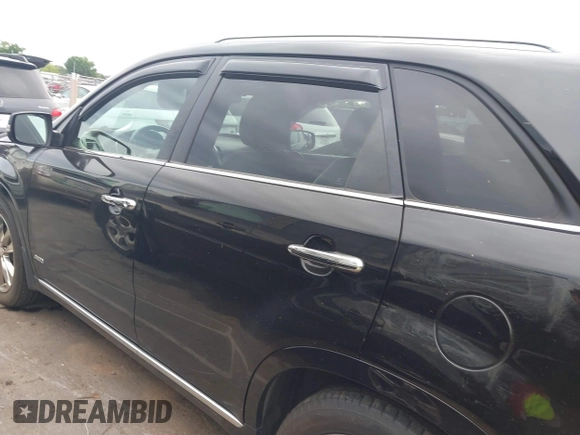 2014 Kia Sorento SX z VIN 5XYKWDA7XEG485405, wystawiony jako IAAI lot #42312938 z przebiegiem 169 728 mil mil oraz . Historia ofert i sprzedaży dostępna na DreamBid. Obrazek 14.