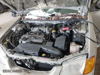 1999 Mazda Protege DX with VIN JM1BJ2229X0125332, listed as a IAAI auction lot 41603003 with 1 mi miles. Bid and sale history available at carsss.com. Image 10.