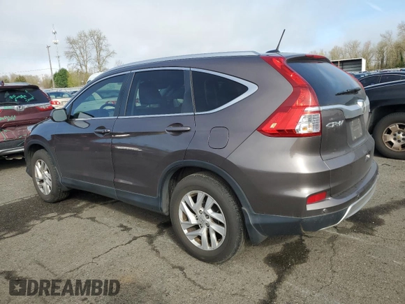 2015 Honda CR-V EX-L with VIN 2HKRM4H79FH617056, listed as a Copart auction lot 50390375 with 73,701 mi miles and Salvage Title. Bid and sale history available at carsss.com. Image 2.