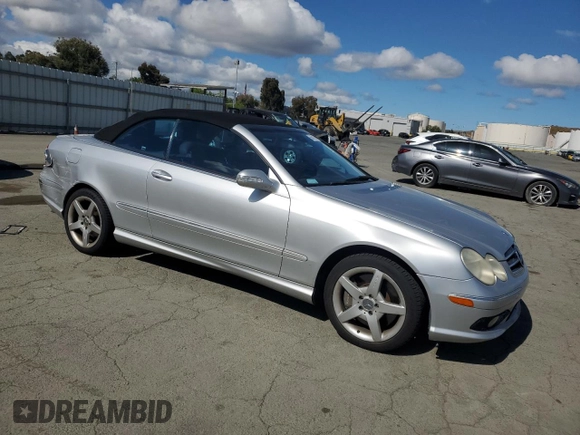 2005 Mercedes-Benz CLK 500 with VIN WDBTK75J85F153391, listed as a Copart auction lot 56691935 with 79,993 mi miles and Salvage title. Bid and sale history available at DreamBid. Image 4.