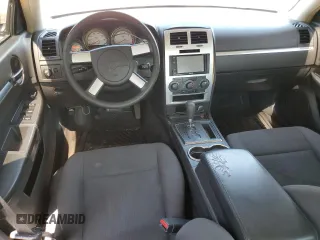 2010 Dodge Charger SXT with VIN 2B3CA3CV9AH165255, listed as a Copart auction lot 52170825 with 223,676 mi miles and Clean Title. Bid and sale history available at carsss.com. Image 8.