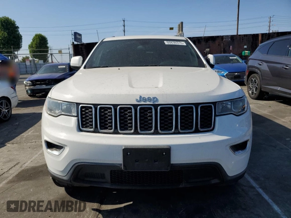 2021 Jeep Grand Cherokee Laredo E with VIN 1C4RJEAGXMC719497, listed as a Copart auction lot 60830315 with 3,873 mi miles and Salvage title. Bid and sale history available at DreamBid. Image 5.