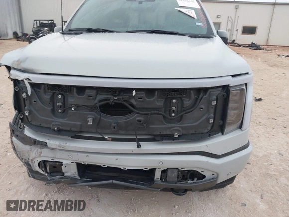 2023 Ford F-150 Lightning Pro z VIN 1FTVW1EL7PWG19070, wystawiony jako IAAI lot #41536193 z przebiegiem 22 654 mil mil oraz . Historia ofert i sprzedaży dostępna na DreamBid. Obrazek 21.