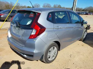 2018 Honda Fit LX with VIN 3HGGK5H43JM735424, listed as a IAAI auction lot 41381399 with 105,044 mi miles. Bid and sale history available at carsss.com. Image 4.