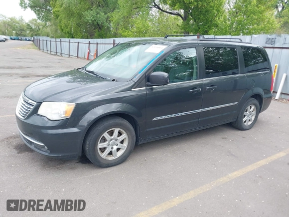 2012 Chrysler Town & Country Touring with VIN 2C4RC1BG1CR312532, listed as a IAAI auction lot 42194864 with 197,609 mi miles and . Bid and sale history available at DreamBid. Image 2.