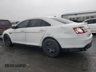 2014 Ford Police Interceptor with VIN 1FAHP2L83EG138213, listed as a Copart auction lot 83946044 with 130,742 mi miles and Salvage title. Bid and sale history available at DreamBid. Image 2.