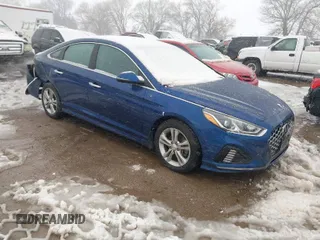 2019 Hyundai Sonata SEL with VIN 5NPE34AF3KH809604, listed as a IAAI auction lot 41833563 with 59,016 mi miles and . Bid and sale history available at DreamBid. Image 1.