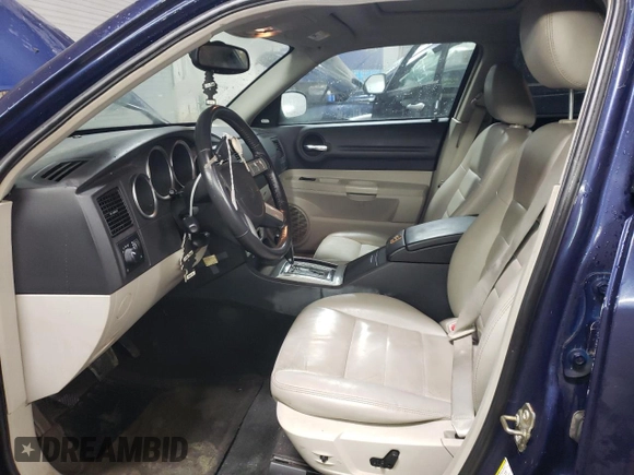 2006 Dodge Magnum R/T z VIN 2D4GV57216H293287, wystawiony jako Copart lot #83601344 z przebiegiem 249 114 mil mil oraz Szkody całkowita. Historia ofert i sprzedaży dostępna na DreamBid. Obrazek 7.