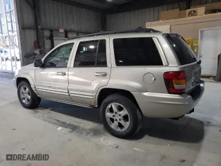 2003 Jeep Grand Cherokee Limited with VIN 1J4GW58NX3C572555, listed as a Copart auction lot 80675454 with 174,894 mi miles and Salvage Title. Bid and sale history available at carsss.com. Image 2.