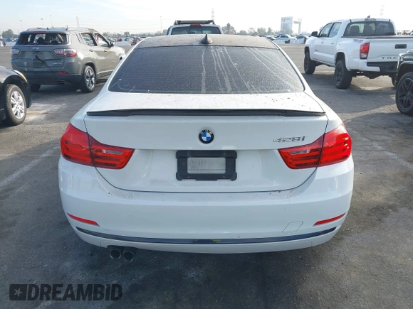 2014 BMW 4 Series 428i with VIN WBA3N3C5XEF710869, listed as a IAAI auction lot 40984116 with 115,958 mi miles and . Bid and sale history available at DreamBid. Image 16.