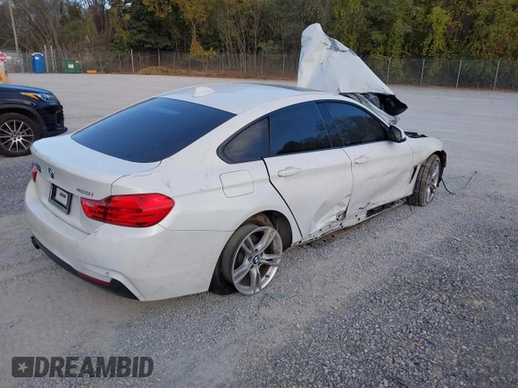 2015 BMW 4 Series 428i xDrive z VIN WBA4C9C57FD330866, wystawiony jako IAAI lot #40574326 z przebiegiem 123 726 mil mil oraz . Historia ofert i sprzedaży dostępna na DreamBid. Obrazek 4.