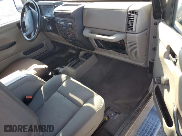 2004 Jeep Wrangler Sahara with VIN 1J4FA59S14P755450, listed as a Copart auction lot 58558005 with 194,044 mi miles and Salvage title. Bid and sale history available at DreamBid. Image 8.