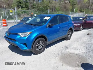 2018 Toyota RAV4 LE with VIN JTMZFREV4JJ734702, listed as a IAAI auction lot 41987540 with 141,526 mi miles. Bid and sale history available at carsss.com. Image 19.