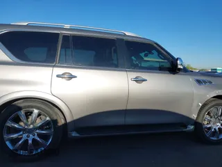 2012 Infiniti QX56 7-passenger with VIN JN8AZ2NFXC9515305, listed as a IAAI auction lot 42031957 with 185,173 mi miles. Bid and sale history available at carsss.com. Image 13.