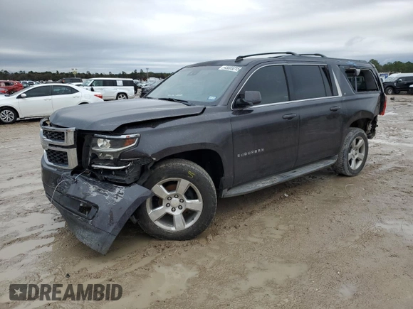 2015 Chevrolet Suburban LT with VIN 1GNSCJKC1FR159411, listed as a Copart auction lot 52169465 with 145,511 mi miles and Salvage title. Bid and sale history available at DreamBid. Image 1.