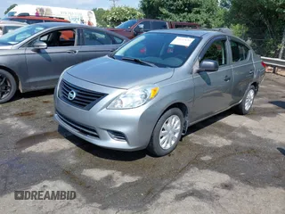 2013 Nissan Versa S Plus with VIN 3N1CN7AP6DL894312, listed as a IAAI auction lot 42637634 with 145,368 mi miles and . Bid and sale history available at DreamBid. Image 2.