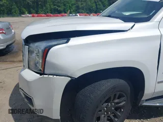 2017 GMC Yukon XL SLT z VIN 1GKS2GKC5HR160468, wystawiony jako IAAI lot #42166908 z przebiegiem 131 469 mil mil oraz . Historia ofert i sprzedaży dostępna na DreamBid. Obrazek 19.