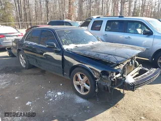2003 Mercury Marauder with VIN 2MEHM75V23X626397, listed as a IAAI auction lot 41379235 with 326,372 mi miles. Bid and sale history available at carsss.com. Image 1.