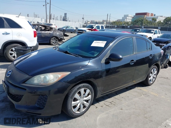 2013 Mazda 3 i Sport with VIN JM1BL1U7XD1702243, listed as a IAAI auction lot 42001182 with 115,257 mi miles and . Bid and sale history available at DreamBid. Image 2.