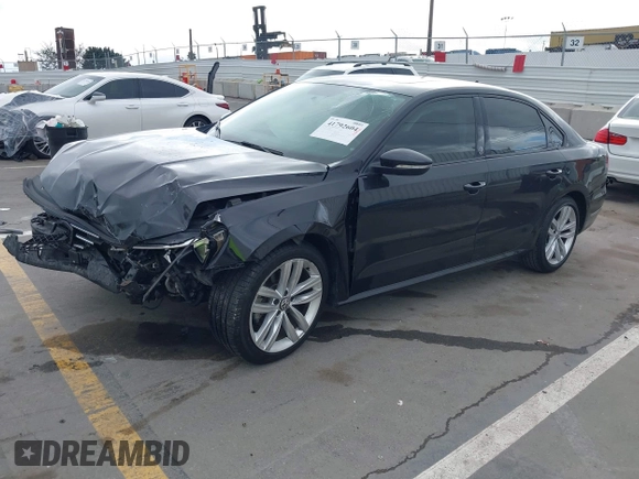 2019 Volkswagen Passat 2.0T Wolfsburg Edition with VIN 1VWLA7A34KC012887, listed as a IAAI auction lot 41792604 with 70,237 mi miles. Bid and sale history available at carsss.com. Image 2.