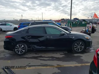 2016 Kia Optima SX Turbo with VIN 5XXGW4L2XGG052746, listed as a IAAI auction lot 41306792 with 69,571 mi miles and . Bid and sale history available at carsss.com. Image 13.