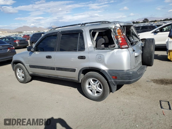 2000 Honda CR-V LX with VIN JHLRD1849YC047923, listed as a Copart auction lot 77041664 with 235,211 mi miles and Salvage Title. Bid and sale history available at carsss.com. Image 2.