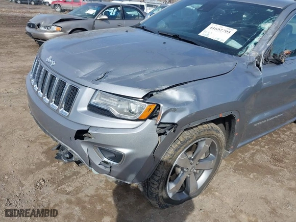 2014 Jeep Grand Cherokee Overland with VIN 1C4RJFCT8EC246264, listed as a IAAI auction lot 41692795 with 197,851 mi miles. Bid and sale history available at carsss.com. Image 6.