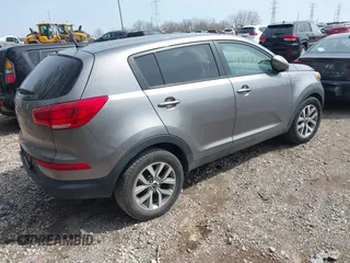 2015 Kia Sportage LX with VIN KNDPBCAC6F7790469, listed as a IAAI auction lot 41942732 with 74,612 mi miles and . Bid and sale history available at DreamBid. Image 4.
