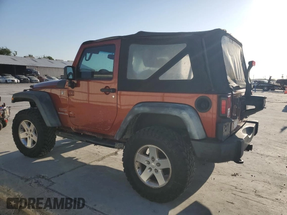 2014 Jeep Wrangler Sport with VIN 1C4AJWAG8EL169530, listed as a Copart auction lot 51788825 with 197,642 mi miles and Salvage Title. Bid and sale history available at carsss.com. Image 2.