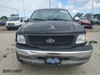 2002 Ford F-150 XL with VIN 2FTRX07222CA18022, listed as a Copart auction lot 80419784 with 283,975 mi miles and Salvage Title. Bid and sale history available at carsss.com. Image 5.