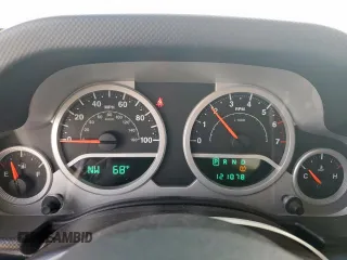 2009 Jeep Wrangler Sahara z VIN 1J4FA54169L780809, wystawiony jako Copart lot #50598925 z przebiegiem 121 078 mil mil oraz Szkoda całkowita • Salvage title. Historia ofert i sprzedaży dostępna na DreamBid. Obrazek 9.
