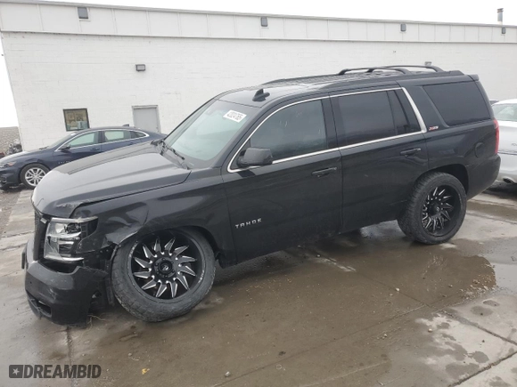 2019 Chevrolet Tahoe LT with VIN 1GNSKBKC7KR306530, listed as a Copart auction lot 42024765 with 122,249 mi miles and Salvage Title. Bid and sale history available at carsss.com. Image 1.