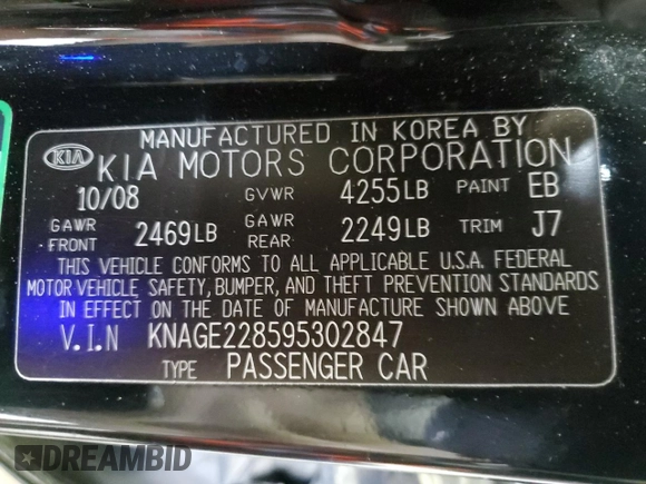 2009 Kia Optima LX z VIN KNAGE228595302847, wystawiony jako Copart lot #59187765 z przebiegiem 235 667 mil mil oraz Czysty tytuł • Clean title. Historia ofert i sprzedaży dostępna na DreamBid. Obrazek 13.