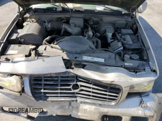 2000 Cadillac Escalade z VIN 1GYEK63R8YR228214, wystawiony jako Copart lot #73567434 z przebiegiem 235 399 mil mil oraz Szkody całkowita. Historia ofert i sprzedaży dostępna na DreamBid. Obrazek 12.
