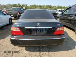2002 Acura RL with VIN JH4KA96512C013028, listed as a Copart auction lot 71436914 with 142,527 mi miles and Salvage Title. Bid and sale history available at carsss.com. Image 6.